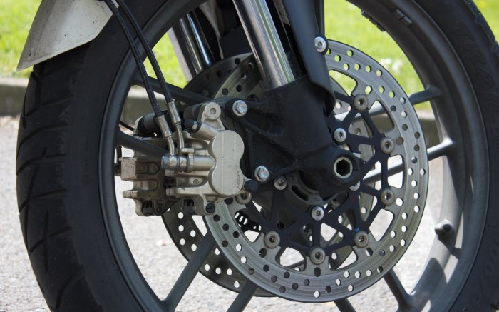 Two-pot sliding Nissin callipers are very old tech